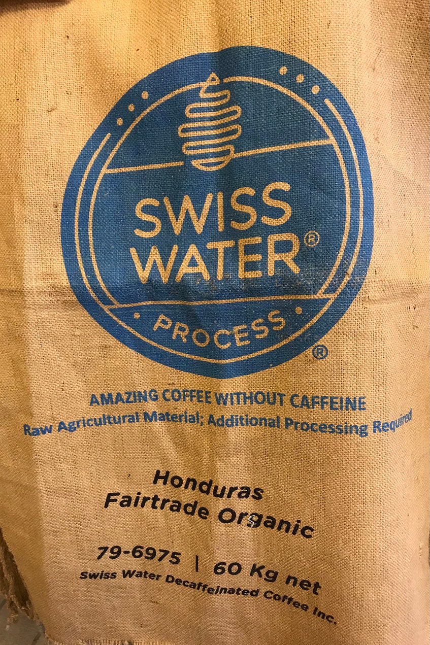 Zierkissen Swiss Water – Detail des blauen Kaffeesack-Motivs